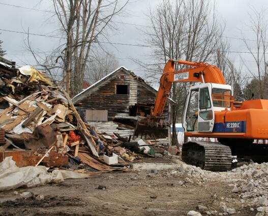 Piling up the wood building and crushed cement