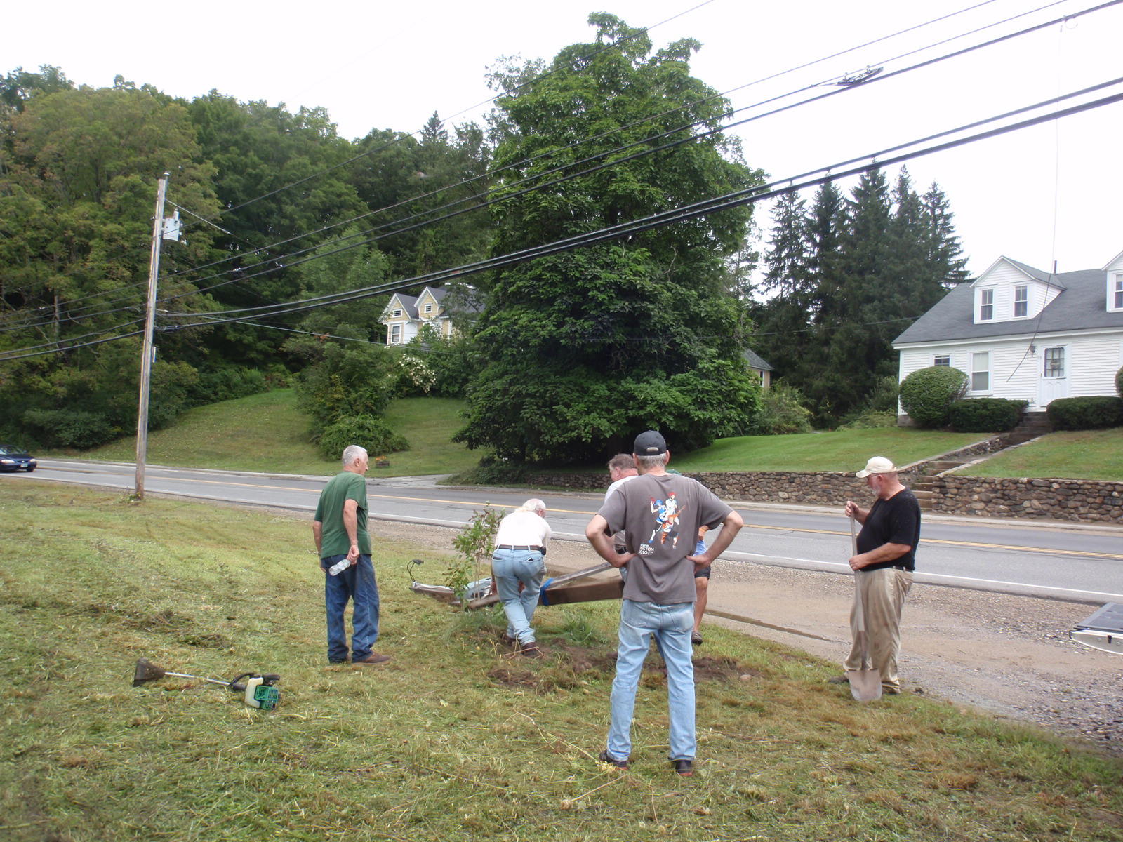 Removing the electric meter thanks to the Conservation Commission and two friendly helpers