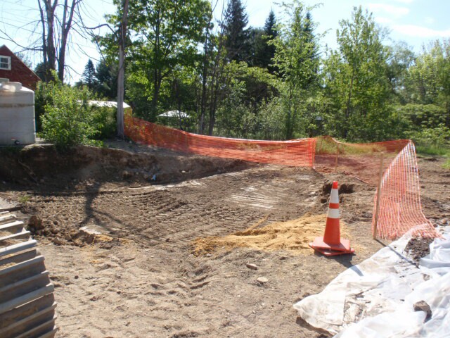 A large hole in the ground where Ernie's once sat