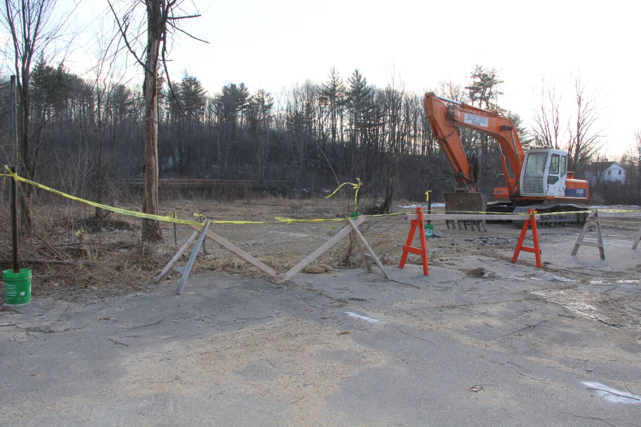 View of Ernie's with last of heavy equipment