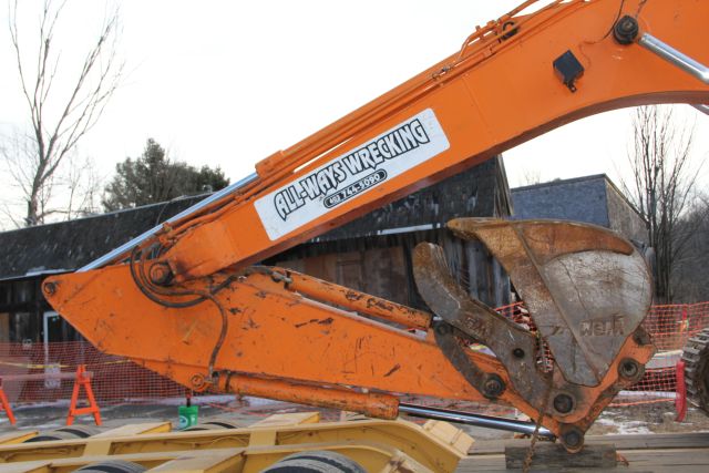 Ernie's garage with backhoe ready to start work