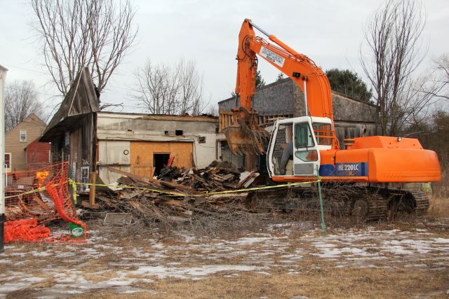 Ernie's garage roof is gone and side wall is down