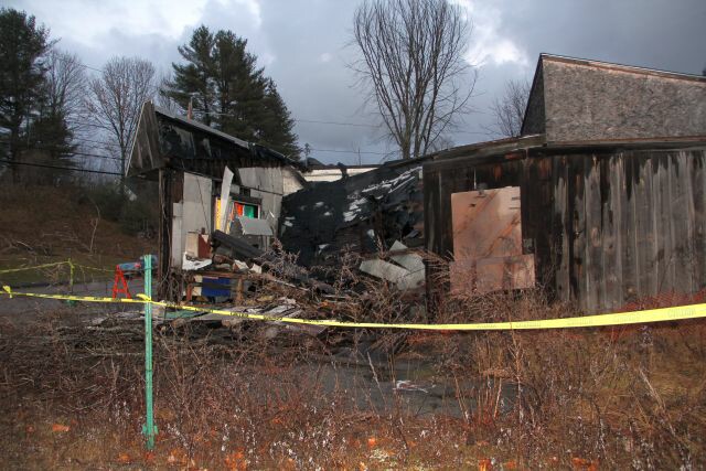 Looking at the inside of Ernie's Garage through the collapsed wall